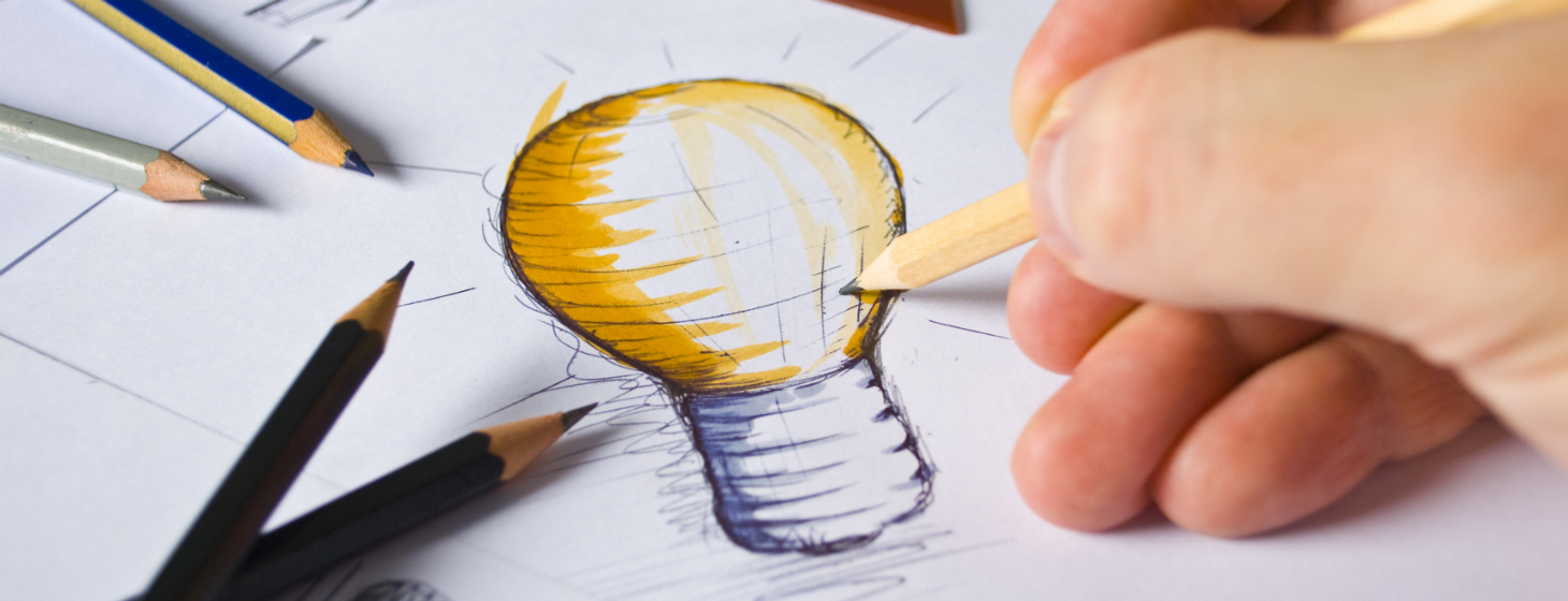 A UX Architect sketching out a bright idea
