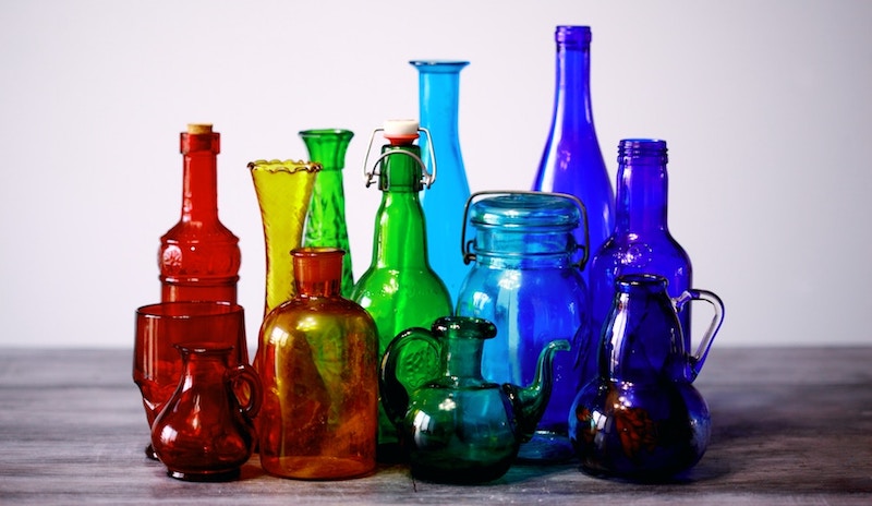 Jars and vases in a variety of shapes, sizes, and colors