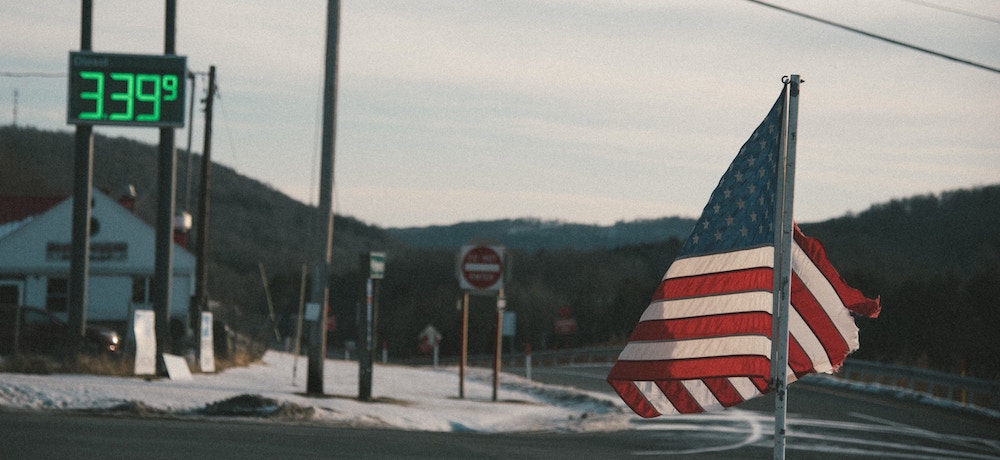 An aging flag flies in a small town