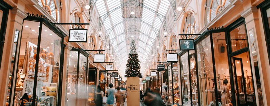 Holiday shoppers walk the mall.