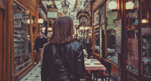 lady walking through neat shopping corridor and considering her options trymyui ux research blog