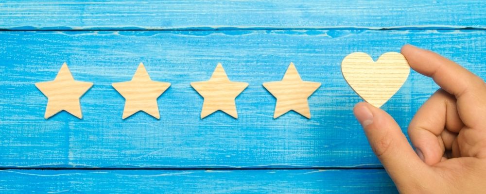 sharing feedback stars and a heart customer loyalty