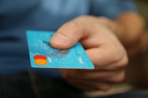 man shopping credit card pay