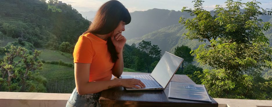 remote user research woman outdoors on laptop